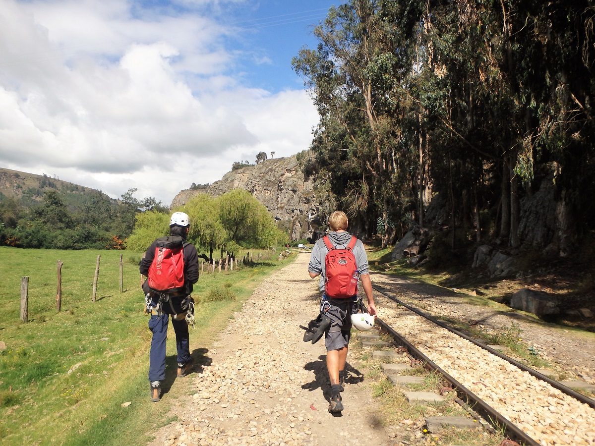 Walking along the train tracks beside the crag to find our first cllimb spot