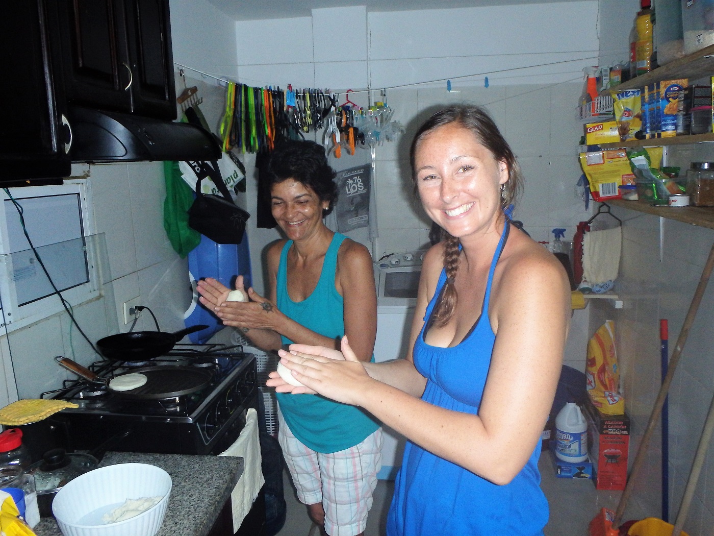 Me making arepas with our friend's mother-in-law