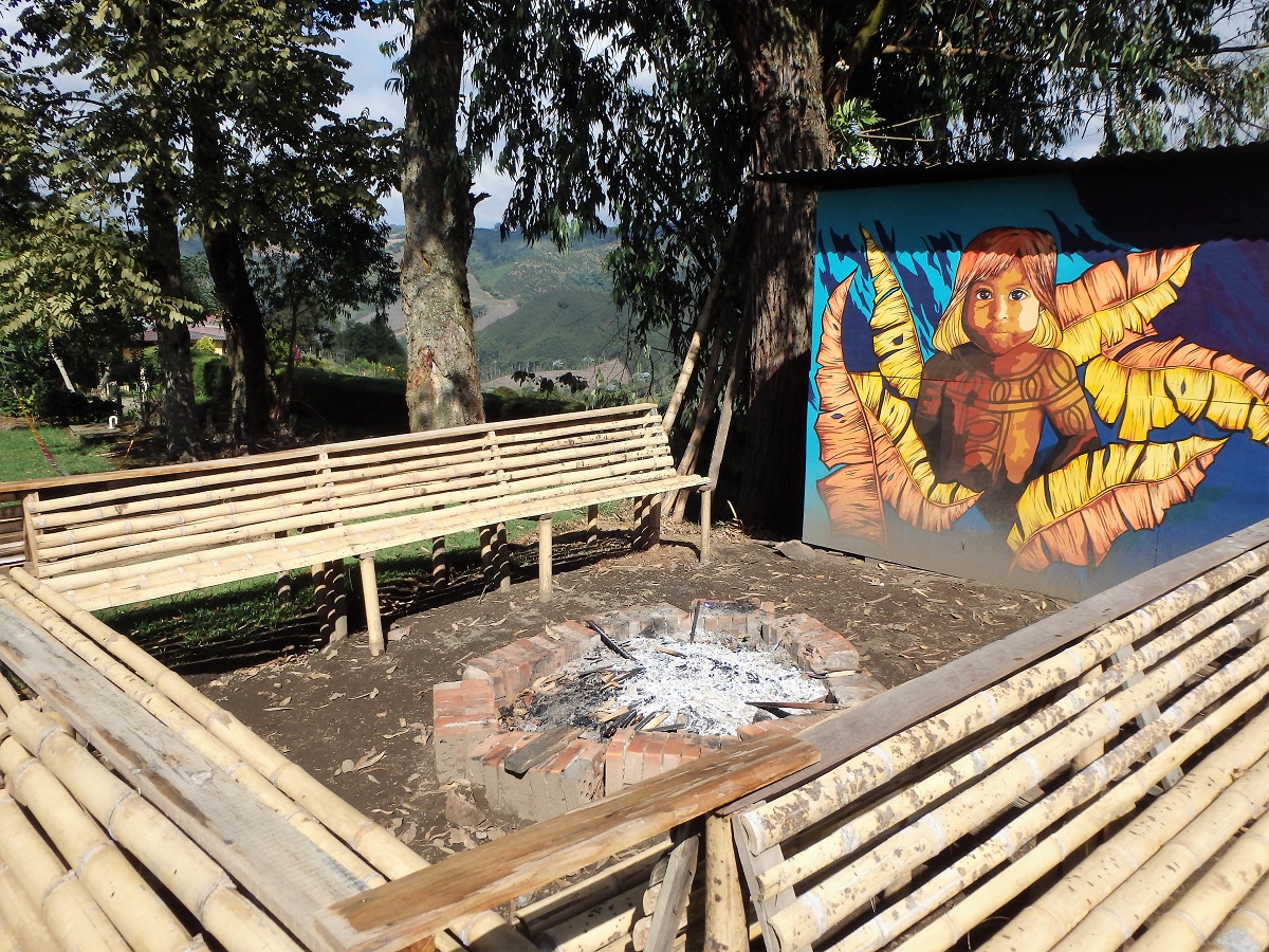 The fire pit was surrounded by benches with an awesome mural on the wall