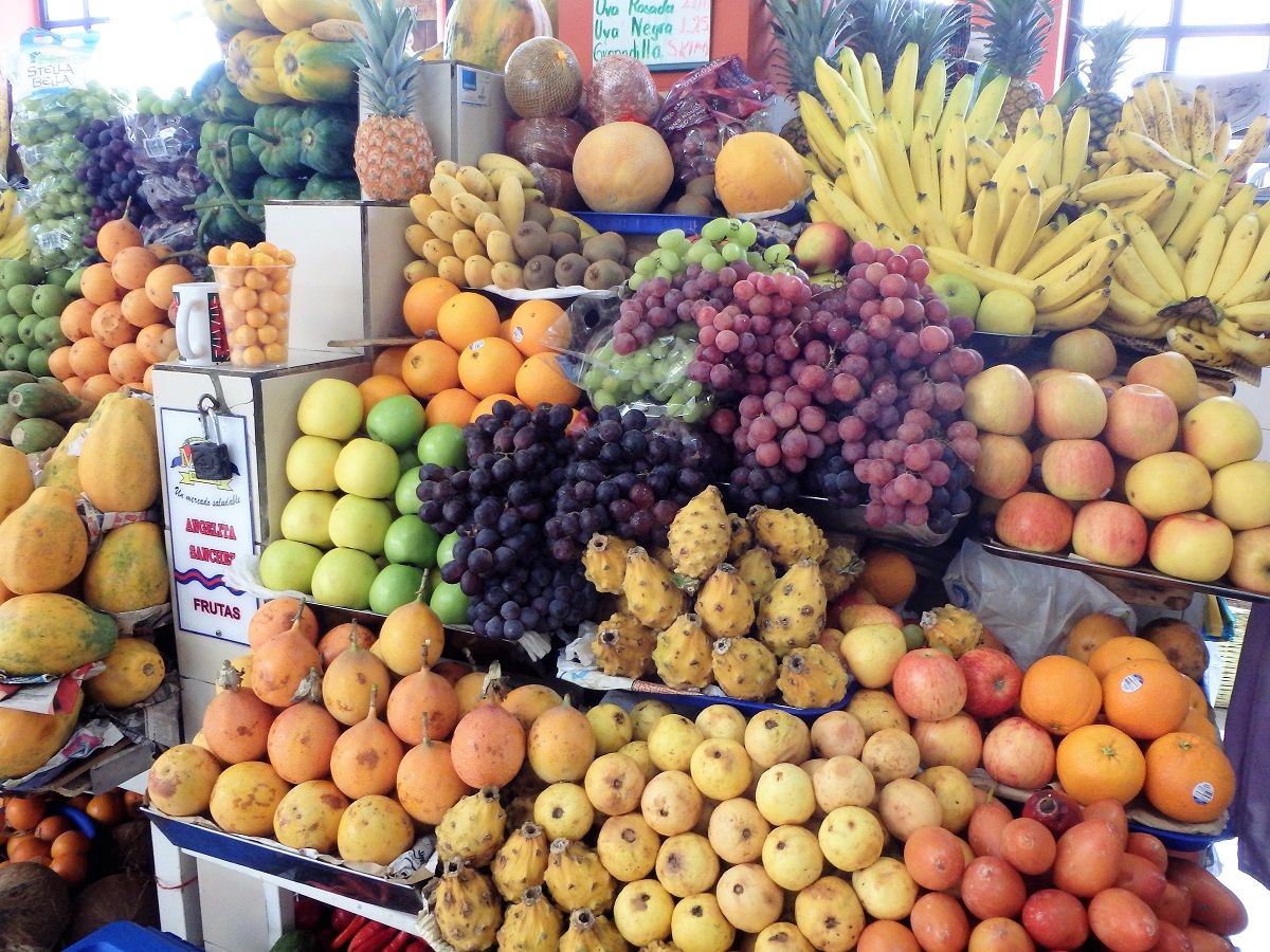 A vibrant fruit stand in Quito's central market