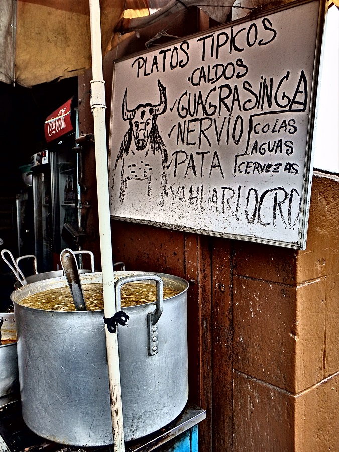 A huge pot of caldo, also known as bulls-penis soup...