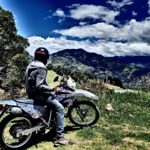 Rhys on the motorbike admiring the awesome views