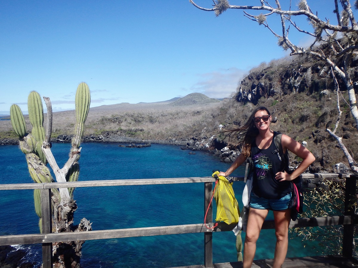 Me ready with my snorkel equipment and the awesome views of Frigate Cove beyond