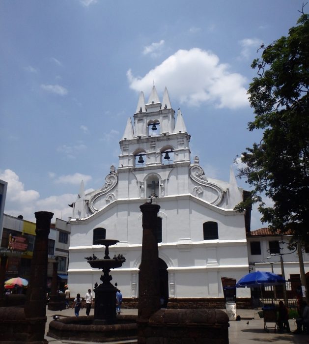 A white church within a courtyard