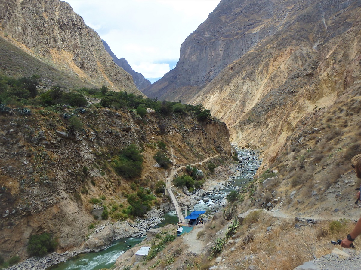 Near the valley base where a bridge crosses the Colca Canyon