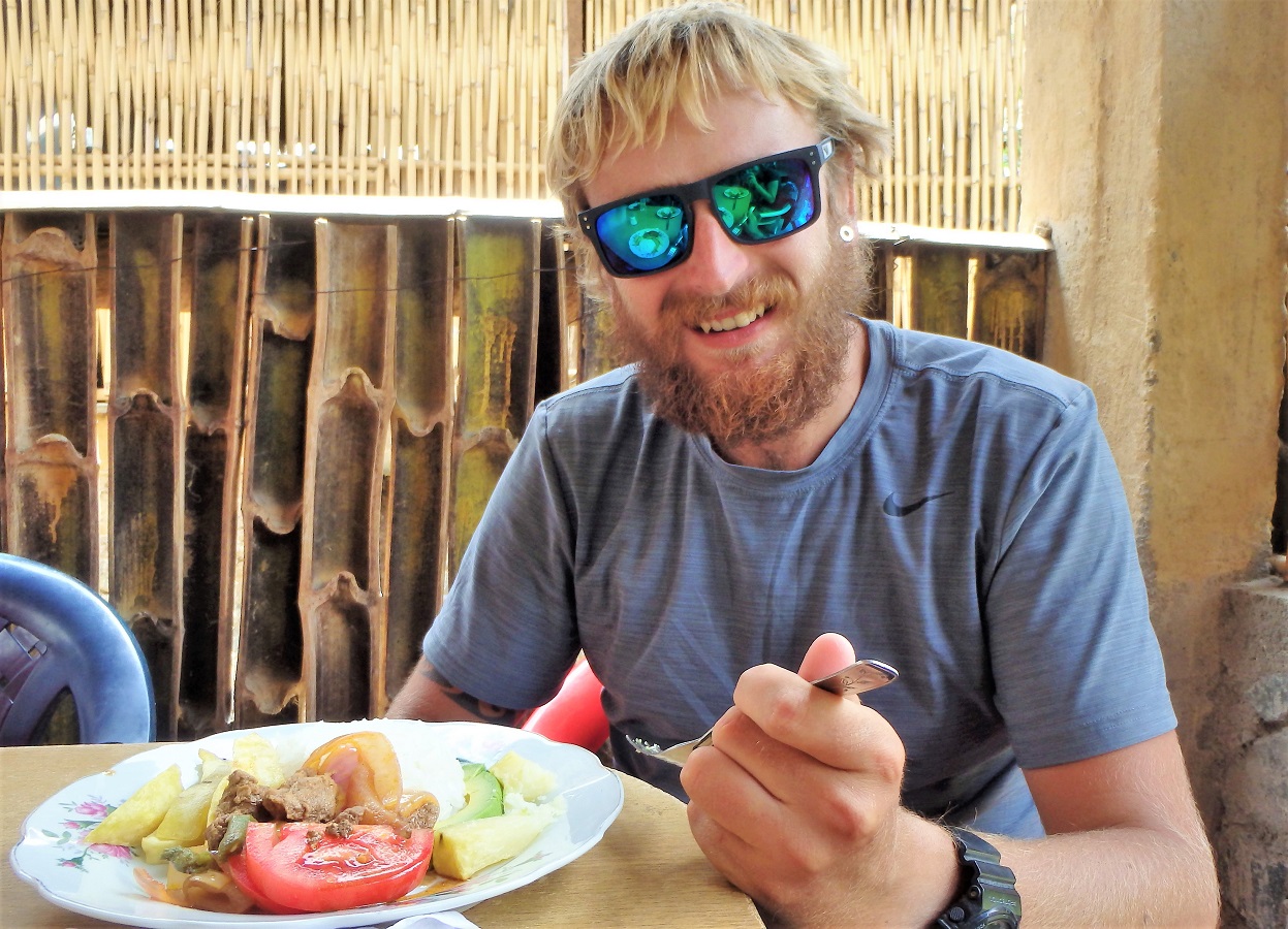 Rhys with his plate of lomo saltado, before I ate it