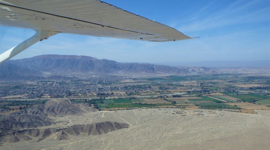 A shot out the plane over the desert