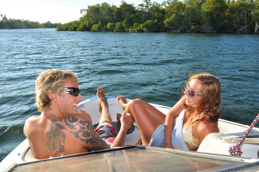 Rhys and I sharing a laugh on the front of a boat in Cayman