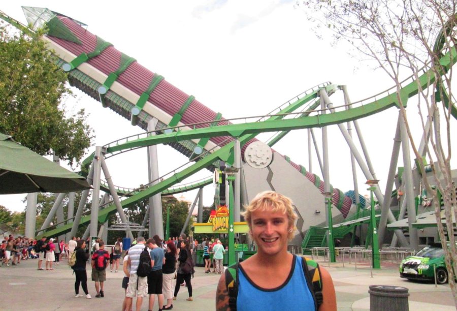 Rhys in front of a rollercoaster